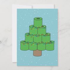 a christmas tree made out of rolls of toilet paper on top of a blue background