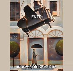 a man holding an umbrella in front of a building with the words entp on it