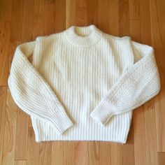 Super Cute Creamy White Sweater! New With Tags! Very Warm And Cozy Alpaca Wool Blend. Ribbed Mock Neck, Hem, And Cuffs, Long Sleeves. Nwt Size Large, Great Oversize Sweater For Smaller Sizes Too! Measurements (Approx) Pit To Pit: 23" Length: 23" Winter, Fall, Autumn, Cream, Neutral, Academia, Cottagecore, Cottage Core, Grandma, Cable Knit, Turtleneck, Box, Boxy, Balloon, Off White, Fuzzy Reposhing This Item I Purchased From @Tvaughan1. Loved It, But Ready To Rotate For Something New. Questions? H&m White Winter Sweater, Cottage Core Grandma, Oversized Red Sweater, Blue Long Sleeve Sweater, Cable Knit Turtleneck, Cottagecore Cottage, Oversize Sweater, Cream Knit Sweater, White Knit Sweater