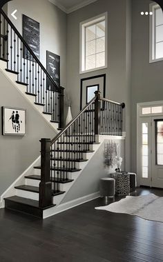 the stairs in this house are black and white