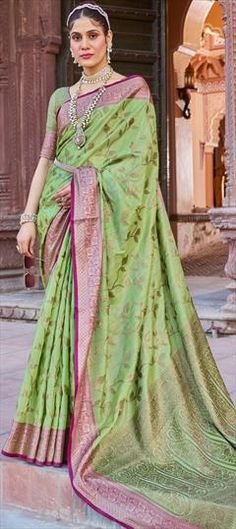 Green color Saree in Silk cotton fabric with Weaving work Green Cotton Saree With Zari Weaving, Green Cotton Saree With Zari Work, Multicolor Cotton Fabric For Wedding, Green Fabric With Printed Motifs, Cotton Fabric For Wedding And Festivals, Green Cotton Fabric With Printed Motifs, Green Color Saree, Party Wear Traditional, Traditional Saree