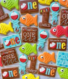 decorated cookies with words and fish on them