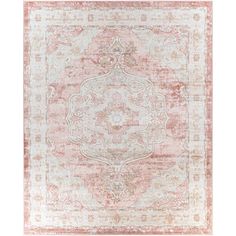 an antique style rug in pink and beige tones