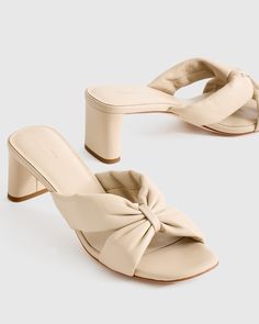 Elevate your style with these Italian Leather Twist Mid Heel Mules. Crafted from luxurious Italian leather, these mules feature a unique twist detail for a modern and sophisticated look. The mid heel provides just the right amount of height for all-day comfort, making them perfect for both casual and dressy occasions. Slip into these chic mules and step out in style wherever you go.  | Quince | Women's Italian Leather Twist Mid Heel Mule in Almond, Size 10 Heel Mules, Sophisticated Look, Wrap Heels, Sheep Leather, Mid Heel, Leather Wraps, Quince, Elevate Your Style, Leather Working