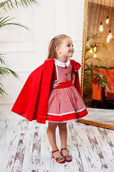 This cute Little Red Riding Hood outfit is comprised of a dress and a cape. It is handmade of non-allergic checkered pattern and plain red cotton fabric and the skirt is made fluffier with a crystal tulle inlay. It has a zipper on the back for an easy dressing up. The cape is reversible with a polka dotted cotton lining and attached with a hook and clasp. It is a perfect outfit for first birthday party, Halloween, photo shooting and many other special events. Handmade and customized for your own Little Red Riding Hood Toddler Costume, Little Red Riding Hood Costume Toddler, Little Red Riding Hood Outfit, Red Riding Hood Outfit, Red Riding Hood Dress, Riding Hood Costume, Birthday Party Halloween, Baby Costumes Girl, Red Riding Hood Costume