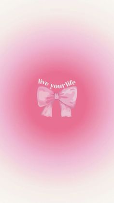 a pink bow with the words live, your life written on it in white lettering