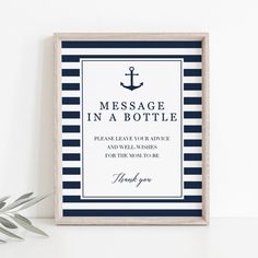 a framed message in a bottle with an anchor on it