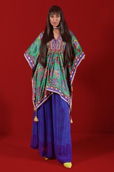 Emerald green self paisley print kaftan top with hand embroidery. Paired with a navy blue self print pleated palazzo. - Aza Fashions Green Bohemian Traditional Wear With Bandhani Print, Bohemian Green Traditional Wear With Bandhani Print, Green Bohemian Dupatta With Printed Motifs, Bohemian Silk Sets With Multicolor Embroidery, Bohemian Multicolor Embroidered Dupatta With Dabka, Green Bohemian Jamawar Dupatta, Green Jamawar Bohemian Dupatta, Bohemian Designer Green Sets, Traditional Paisley Print Kurta For Festivals