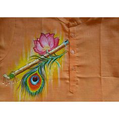 an orange shirt with a peacock feather on it and a flower painted on the front