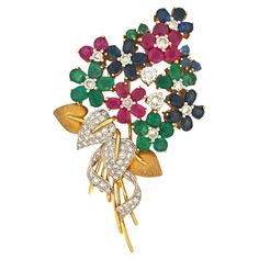 Journey back in time to the opulent 20th century with this exquisite Emerald, Ruby, Sapphire, and White Diamond Bouquet Brooch. A harmonious medley of gemstones adorns this vintage masterpiece, with vibrant emeralds, deep rubies, brilliant sapphires, and scintillating white diamonds uniting in a breathtaking bouquet. This brooch showcases a remarkable 2.69 carats of white diamonds, providing a brilliant backdrop for the captivating 10.73 carats of colorful gemstones. Weighing a substantial 22.7 grams, it exudes an aura of timeless elegance and craftsmanship reminiscent of a bygone era. Wearing this brooch is not just a fashion statement; it's a connection to history. It's a testament to the enduring beauty and grandeur of the 20th century, encapsulated within the fine details of its design Diamond Bouquet, Remarkable 2, Colorful Gemstones, Bouquet Brooch, Brooch Bouquets, Bygone Era, Ruby Sapphire, Flower Tops, Back In Time