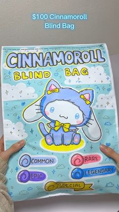 a person holding up a bag with an image of a cat on it and the words,'ginamoroll blind bag '