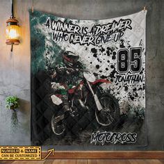 a dirt bike tapestry hanging on the wall