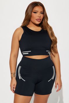 Available In Black. Active Top Scoop Neck Sleeveless Padded Cropped Active Biker Short High Waisted, Elastic Waistband Elevate Reflective Detail High Performance Stretch Body: 73% Polyester 27% Spandex Inner Mesh: 82% Nylon 18% Spandex Imported | Sprint Reflective Elevate Active Set in Black size XS by Fashion Nova Sleeveless Black Seamless Activewear, Black Seamless Sleeveless Tank Top, Black Sleeveless Seamless Tank Top, Black Sports Bra With Built-in Bra, Black Stretch Tank Sports Bra, Sleeveless Gym Crop Top With Built-in Bra, Black Activewear With Medium Support And Tank Straps, Black Tank Top For Yoga With Bust Support, Black Tank Top With Bust Support For Yoga