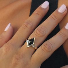 "This dainty ring is made of 925 silver. It is a rhombus ring with a black onyx stone (natural). A unique and special women's ring. If you are the type of person who likes to command \"attention\", you will do it better by supplementing daily clothes with fashion jewelry. Jewelry and clothes can be used to define who you are and want you want to project. Jewelry is an essential part of personality. This accessory will add style in your outfit. A geometric and minimalistic ring that can be an ama Modern Diamond-shaped Promise Ring, Rhombus Ring, Minimalistic Ring, Onyx Ring Men, Rhombus Shape, Daily Clothes, Type Of Person, Do It Better, Zierlicher Ring