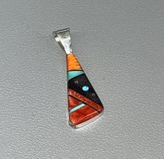 Zuni handmade sterling silver pendant 1 and 5/8" tall Unique Silver Turquoise Necklace With Inlay, Unique Sterling Silver Turquoise Inlay Necklace, Sterling Silver Multi-stone Turquoise Necklace, Gift Turquoise Necklace With Sterling Silver Inlay, Artisan Turquoise Pendant Necklace With Inlay, Southwestern Turquoise Inlay Pendant Necklace, Zuni Jewelry, Handmade Sterling Silver, Silver Turquoise