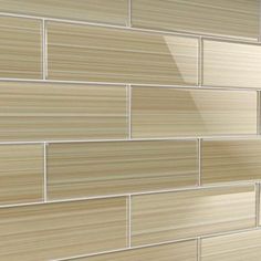 a close up view of a wall made out of wooden planks and white tile