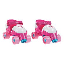 two pink roller skates sitting next to each other