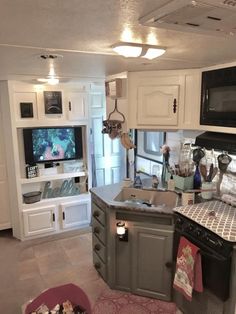 the kitchen is clean and ready to be used as a living room or dining area