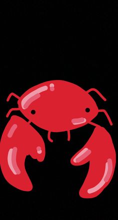 a red crab on a black background