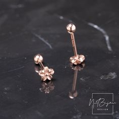 Cute flower Stud earrings, 925 Sterling Silver stud earrings, tiny and minimalistic style.Perfect for everyday use. Wearable on Cartilage, Helix, Conch or Earlobes. Details: Sold by pair 925 sterling silver and 18k gold plated. Gold and rose gold. Gauge size (gold) 18 (1mm) Post length (gold) 7mm Gauge size (rose gold) 18 (1mm) Post length (rose gold) 11mm Weight: 0.82 grams (pair) Length : 5mm AAA grade diamonds simulants. Nickel free. Hypoallergenic. All orders will be shipped out within 1 bus Tiny Elegant Rose Gold Cartilage Earrings, Tiny Dainty Rose Gold Earrings, Elegant Tiny Rose Gold Cartilage Earrings, Dainty Rose Gold Drop Cartilage Earrings, Dainty Rose Gold Sterling Silver Cartilage Earrings, Dainty Rose Gold Sterling Silver Piercings, Minimalist Rose Gold Sterling Silver Piercings, Delicate Tiny Sterling Silver Piercings, Elegant Rose Gold Internally Threaded Cartilage Earrings