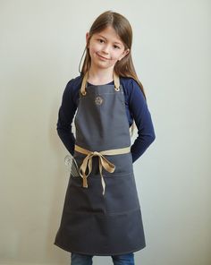 Protect your little one's clothing while they look cute as can be. Handmade in our Omaha, NE studio using only the finest materials. Toddler Art Projects, Shop Apron, Denim Apron, Toddler Age, Toddler Art, Kids Apron, One Clothing, Cooking Apron, Brand Marketing