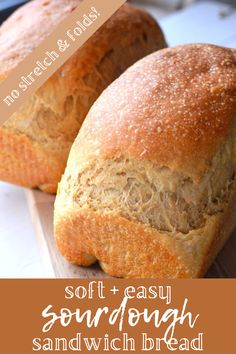 two loaves of bread sitting on top of a cutting board with the words soft and easy sourdough sandwich bread