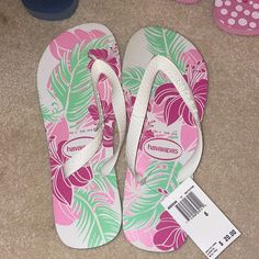 Size Usa 6 White Tropical Style Flip Flops For Spring, White Tropical Flip Flops For Spring, White Tropical Style Spring Flip Flops, White Tropical Flip Flops For Beach Season, White Tropical Open Toe Flip Flops, Pink Slip-on Flip Flops For Beach Season, Non-slip Pink Flip Flops For Vacation, Pink Tropical Style Flip Flops With Round Toe, Pink Tropical Style Open Toe Flip Flops