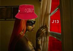 a woman with long red hair wearing a pink hat and sunglasses looking out the window