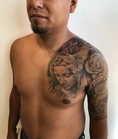 a man with a tattoo on his chest