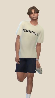 a man in shorts and a t - shirt with the words essentials on it