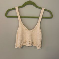 Small, Never Worn Spring Vacation Crochet Knit Top, Spring Knitted V-neck Crop Top, Beige Open Knit Crop Top For Summer, Summer Knit Crochet Top For Day Out, Casual Crochet Lace Top For Spring, Casual Crochet Lace Top For Beach Season, Chic Crop Top With Crochet Trim For Beach, Beach Cotton Open Knit Crop Top, Spring Beige Open Knit Crop Top