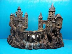 a castle made out of clay on a blue background