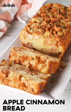 two slices of apple cinnamon bread on a white plate with the words delish above it