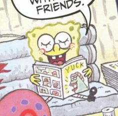 the spongebob is reading a book with his eyes wide open and tongue out