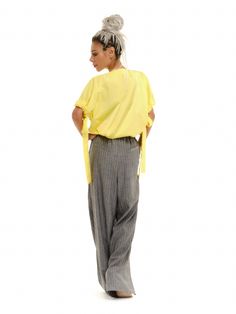 Classy, elegant, and comfy - everything you've always wanted from a pair of pants is now a reality. FEATURES:High-waisted pinstripe wide-leg pants with an elastic waistband, belt, and pockets.100% Handmade. SIZE & FIT: Fit: A relaxed fit with room to moveModel is wearing size Small or S/M View our SIZE CHART before ordering MATERIALS & CARE: Content: Linen Care: Machine wash on cold (30ºC) with a mild detergent. SHIPPING: Made to order, processing time is 15 working days This item will be shipped via DHL Leg Pants Outfit, Skirt Jumpsuit, Wide Leg Linen Pants, Yellow Top, Tie Sleeve, Puff Sleeve Top, Pair Of Pants, Outfit Set, Pants Outfit