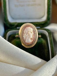 Vintage 9ct Gold Cameo Ring  sweet cameo ring  The item comes without the box in the photos but will be presented in a gembank1973 gift box   Measurements: Weight 2.66g, size O, head of ring 17mm x 12mm, height off finger 6mm Materials: 9ct gold  Hallmarks: hallmarked 375     Condition : The overall condition is very good office use: Elegant Cameo Engraved Ring As Gift, Elegant Cameo Engraved Ring For Gift, Elegant Engraved Cameo Ring For Gift, Vintage 14k Gold Cameo Rings, Vintage Cameo Signet Ring For Anniversary, Antique Cameo Signet Ring For Weddings, Vintage Cameo Engraved Ring For Formal Occasions, Victorian Cameo Rings As Gift, Vintage Cameo Rings For Wedding