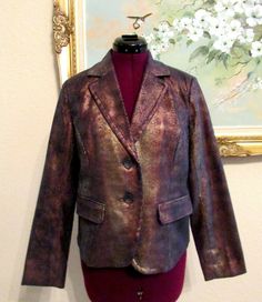 New Erin London copper/gold shimmer iridescent 2 button lined blazer. Size petite small. Two lower flap pockets. Three button cuffs. This blazer changes colors as you move. Extra front button. The color code is 201. The approx. measurements are pit to pit 19". Shoulder to front hem 22.5". Pit to sleeve hem 17". Shoulder to sleeve hem 22". M.S.R.P. $72.00. Excellent condition. Smoke free home. Thank you for looking. Fitted Metallic Blazer For Formal Occasions, Metallic Fitted Blazer For Fall, Metallic Fitted Formal Outerwear, Metallic Fitted Outerwear For Formal Occasions, R P, Gold Shimmer, Color Code, Flap Pocket, Men's Blazer