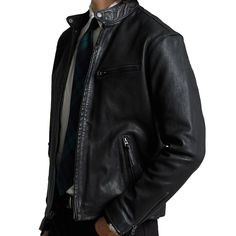 Popularized by European motorcyclists in the 1960s for its slim shape and tapered sleeves, the café racer is a sleek alternative to the traditional biker jacket. Polo Ralph Lauren's version delivers signature luxe style with supple, full-grain leather..Approx. model height is 6'1' and he is wearing a size medium.Size medium has an approx. 26' front body length; 25-1/4' back body length.Stand collar with a signature snapped closure at the front.Full-zip front with a leather pull.Full-zip placket.Long sleeves with gusseted zip cuffs; Ventilating metal grommets at the underarms.Ventilating metal grommets at the underarms.Left chest zip pocket; wo front waist zip pockets.Fully lined and filled.NOTE: Due to the natural characteristics of this material, the coloring may rub off onto fabrics and Fitted Masculine Biker Jacket For Fall, Masculine Fitted Biker Jacket For Fall, Classic Biker Jacket With Padded Collar, Fitted Cafe Racer Biker Jacket For Motorcycling, Classic Fitted Outerwear For Biker Events, Classic Leather Jacket For Motorcycling In Winter, Classic Long Sleeve Leather Jacket For Motorcycling, Fitted Cafe Racer Leather Jacket, Fitted Cafe Racer Outerwear For Motorcycling