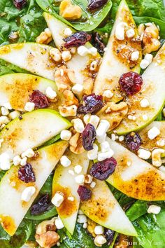 spinach salad with pears, cranberries and nuts