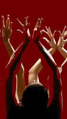 several hands reaching up into the air with their arms extended in front of them, against a red background