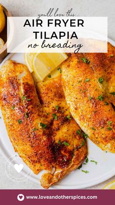 two pieces of chicken on a plate with lemons and parsley