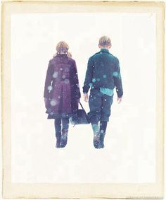 two people walking in the snow holding hands and looking at each other with love written on them