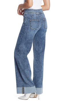 Baggy but not sloppy, these relaxed jeans have a high waist and cuffed hems for an elongated look, plus sustainably sourced fibers for a modern update. 32" inseam; 22 1/4" leg opening; 10 1/2" front rise Zip fly with button closure Five-pocket style 67% cotton, 27% REPREVE® recycled polyester, 5% rayon, 1% spandex REPREVE recycled polyester is made from 100% post-consumer recycled plastic bottles Machine wash, tumble dry Imported Mid-rise Washed Relaxed Fit Flare Jeans, Mid-rise Washed Flare Jeans With Relaxed Fit, High Waist Washed Cropped Jeans With Relaxed Fit, Casual Flare Jeans With Loosely Fitted Hips, Relaxed Fit Mid-rise Flare Jeans, Mid-rise Relaxed Fit Flare Jeans For Casual Wear, Mid-rise Relaxed Fit Flare Jeans For Elevated Casual Occasions, High Waist Medium Wash Relaxed Fit Flare Jeans, Washed Blue High Waist Flare Jeans With Relaxed Fit