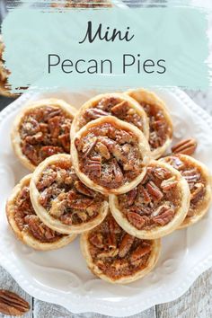 mini pecan pies on a white plate with pecans in the background and text overlay