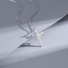 Description & Details Embrace the timeless symbol of faith, spirituality, and devotion with our exquisite pieces inspired by the sacred cross. Each design in our collection is meticulously crafted to honor the significance of the cross and serve as a beautiful reminder of one's beliefs and values. • Material: Solid 925 Sterling Silver • Finish: Hypoallergenic ∙ Gold Plating• Dimensions: 1.46 × 1.6 cm for female, 1.73 × 3.0 cm for male, 40 - 45 cm chain, adjustable• All our work is custom made by Spiritual Cross Pendant Necklaces For Gift, Spiritual Cross Pendant Necklace For Gift, Crucifix Cross Necklace With Clavicle Chain As Gift, White Cross Pendant Necklace With Clavicle Chain, White Cross Necklace With Clavicle Chain, Crucifix Clavicle Chain Jewelry For Gift, Crucifix Clavicle Chain Jewelry Gift, White Cross Necklace As A Gift, White Gold Cross Jewelry For Spiritual Style