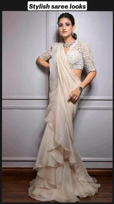 Western Saree Look For Engagement, Stiched Sarees Drape, Ruffel Sarees Designs, White Ruffle Saree, Modern Saree Party Wear, Stiched Sarees, Ruffle Saree Designs, Wedding Dresses Traditional, Stylish Saree