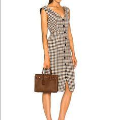 New With Tags Veronica Beard. This Cute Woven Midi Dress Features A Decorative Button Front With A Check Plaid Design For An Eye-Catching, Polished Look. - V-Neck - Sleeveless - Back Concealed Zip With Hook-And-Eye Closure - Front Decorative Buttons; Bottom Two Are Functional - Check Plaid Pattern - Woven Construction - Princess Seams - Lined Bust . Made In Usa Fiber Content Self: 85% Cotton, 13% Polyester, 2% Elastane Lining; 100% Polyester Designer Dresses With Button Closure For Work, Midi Length Office Dress With Button Closure, Buttoned Midi Dress For Work, Designer Midi-length Workwear Dresses, Designer Midi Length Workwear Dresses, Designer Midi Dresses For Work, Chic Office Dress With Button Closure, Mariposa Dress, Cotton Voile Dress