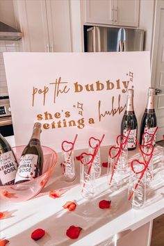 the bachelorette themed party, the final rose, custom mimosa bar, rose petals, custom wine labels, pop the bubbly she's getting a hubby, champagne, heart straws, custom mimosa flutes, bachelorette weekend decor, decor ideas, Bridal Shower Bachelorette Party Ideas, Pop The Bubbly, Bridal Shower Inspo, Nashville Bachelorette Party, Bridal Shower Planning