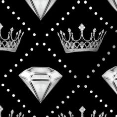 a black and white photo with diamonds and crowns