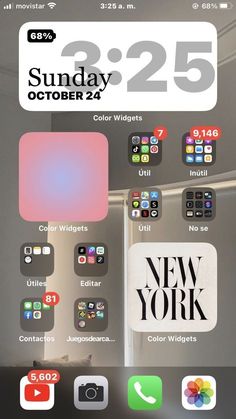 an iphone screen with the new york times logo on it and other icons in different colors